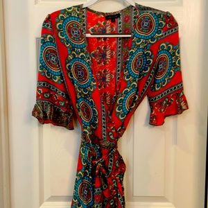 Gorgeous silk like wrap dress.